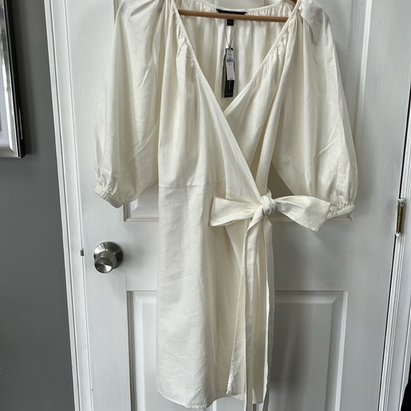 Banana Republic Dresses & Skirts - Banana Republic off white wrap front dress size medium